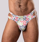 Men's geometric cutout thong with supportive pouch and bold design in red, pink, and gray pattern.