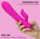 Extra Thicc Chubby Gyrating Rechargeable Silicone Tickler Pink in hand, showcasing ultra-thick design and ribbed texture.