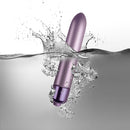 Touch of Velvet Soft Lilac 90mm Bullet Vibrator splashing in water, showcasing its sleek design and features.