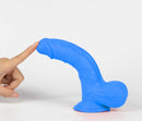 Get Lucky Real Skin Mr Navy 7.5 Inch Dual Layer Dildo with a hand touching its soft blue tip.