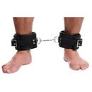 Strict Leather Padded Premium Locking Ankle Restraints featuring padded cuffs on ankles for comfort and security.