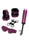 WhipSmart Dragon's Lair 7-Piece Bondage Set in purple, featuring cuffs, hogtie restraints, eye mask, and whip for fantasy play.