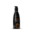 Wicked Aqua Sweet Peach Lubricant 2 Oz bottle with a sleek design and peach graphics for a flavorful experience.