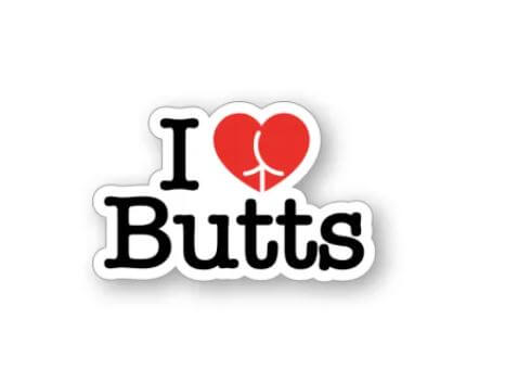 "I Love Butts" enamel pin featuring a playful butt-shaped heart design in red, perfect fun accessory for jackets, bags, or hats.