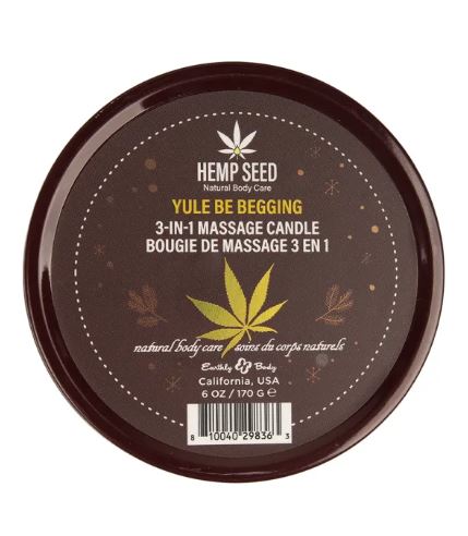Earthly Body Hemp Seed 3-in-1 Massage Candle Yule Be Begging 6 Oz packaging design with festive elements.