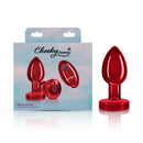 Cheeky Charms Vibrating Red Metal Remote Anal Plug Medium in packaging with remote control.