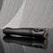 Playboy Pleasure Zone 10-speed vibrating and thrusting shaft with stylish charging case on reflective surface.