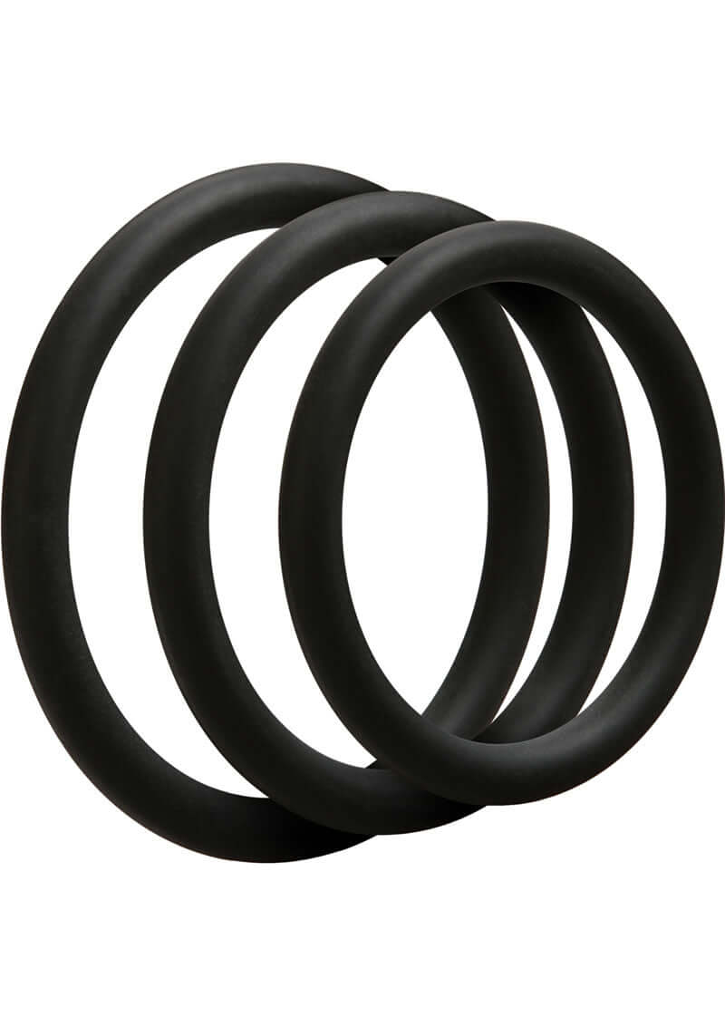 OptiMALE 3-Piece Thin C-Ring Set in Black, Enhanced Performance Silicone Rings in 40mm, 45mm, and 50mm sizes.