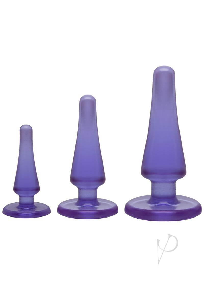 Crystal Jellies Anal Initiation Kit with three purple plugs for backdoor exploration, made of smooth, body-safe materials