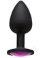 Black silicone butt plug with pink sparkling gem for intimate play