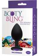 Booty Bling Large Purple butt plug in packaging with radiant gem detail on display