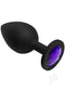 Black silicone booty bling large purple butt plug with dazzling gem detail for intimate play.
