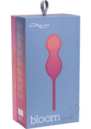 Packaging of We-Vibe Bloom Coral Kegel exerciser and pleasure toy in a gradient pink box.