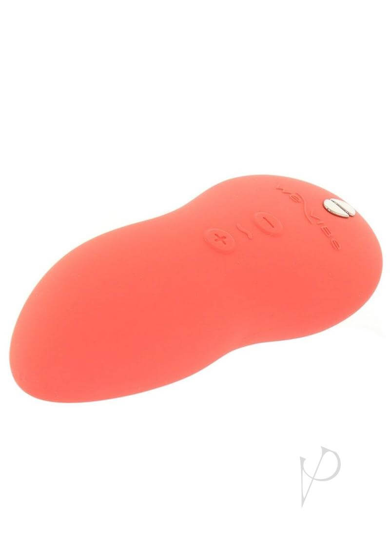 We Vibe Touch X Crave Coral versatile multi-purpose vibrator in coral color for clitoral stimulation and full-body massage.