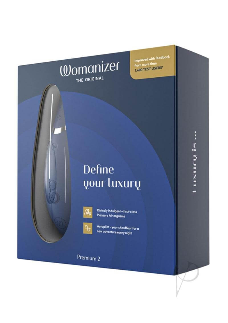 Womanizer Premium 2 Blueberry in packaging with 14 intensity levels, Smart Silence, and improved Autopilot for luxurious experience.