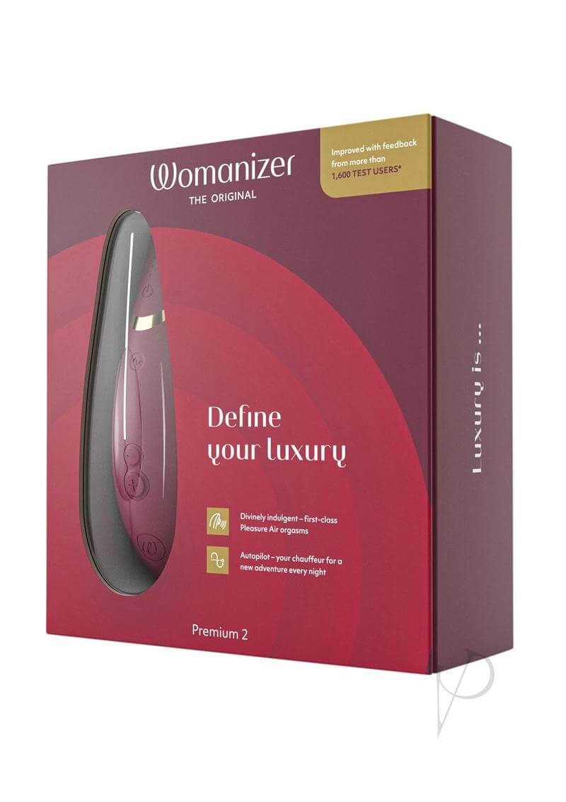 Womanizer Premium 2 Bordeaux in packaging with fourteen intensity levels, Smart Silence, and improved Autopilot feature.