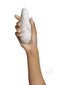 Woman holding Womanizer Marilyn Monroe Special Edition Pleasure Air Technology device in white marble design.