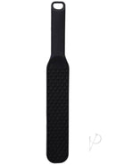 Black spanking paddle with raised dots for precision impact, designed for experienced players seeking enhanced tactile sensations.