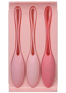 In a Bag Kegel Trainer Pink - Set of three weighted silicone kegel balls for pelvic floor health with attached handles for easy removal