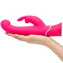 Pink Happy Rabbit G-Spot USB Rechargeable Rabbit Vibrator held in hand for combined clitoral and penetrative stimulation