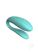 We Vibe Sync Lite Aqua C-Shape vibrator for couples in turquoise, controlled via app for hands-free vibrations and enhanced connection.