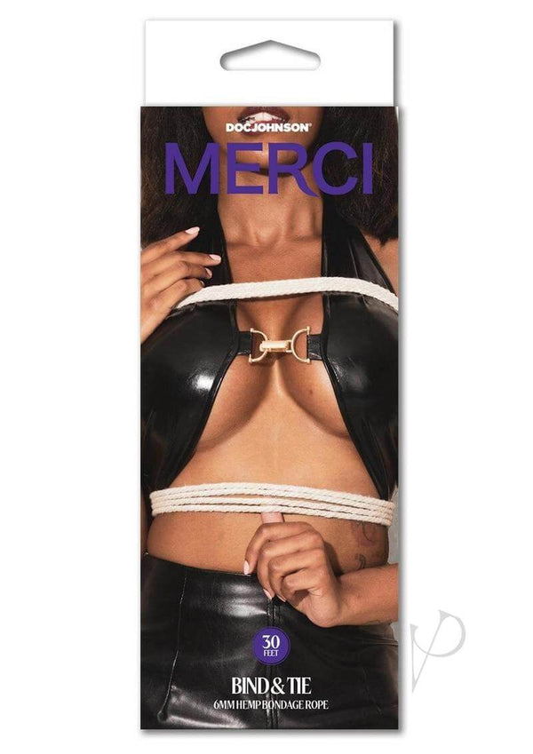 Package of Merci Hogtied Bind and Tie Hemp Bondage Rope displaying a model tied with white rope