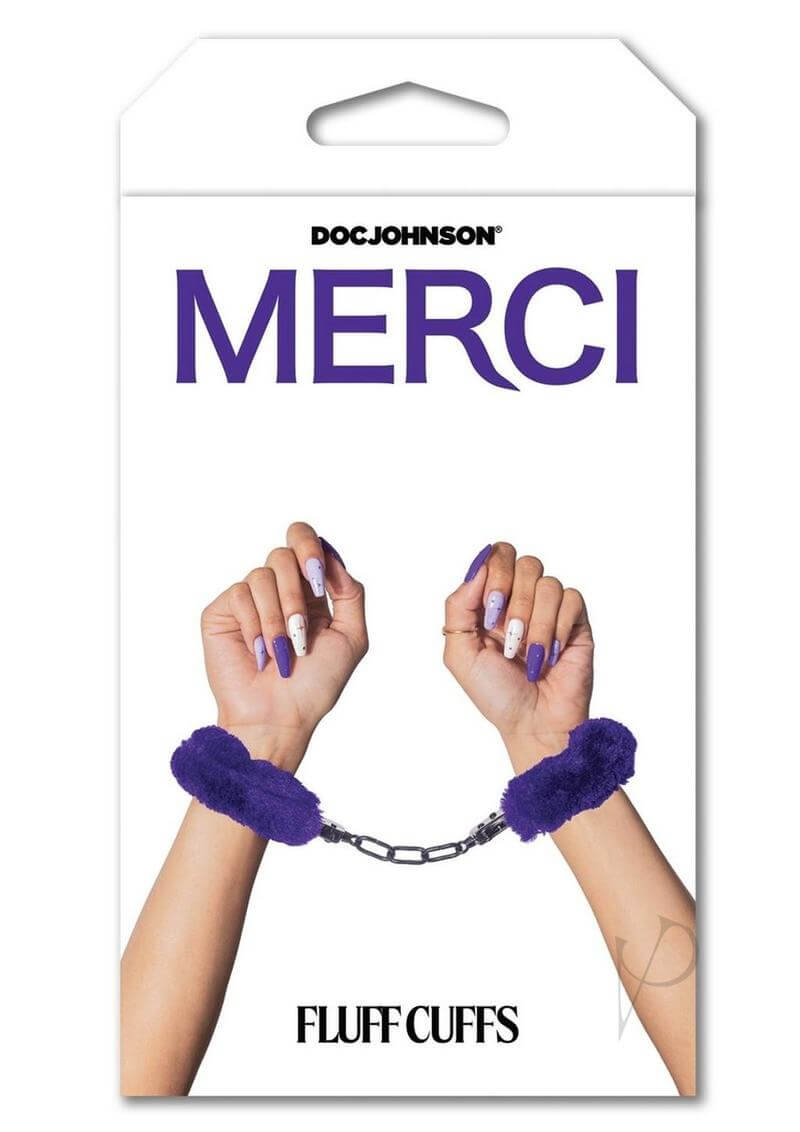 Merci Fluff Cuffs Purple - Faux fur covered metal bondage cuffs in packaging with hands showing luxurious violet restraints.