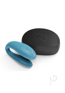 We-Vibe Sync Go turquoise couples vibrator with black travel case for on-the-go pleasure.