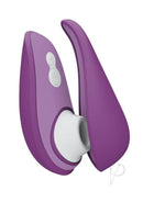 Womanizer LIBERTY 2 in purple, compact and travel-friendly personal pleasure companion with hygienic magnetic cover.