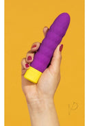 Person holding the ROMP Beat Purple bullet vibrator against a yellow background