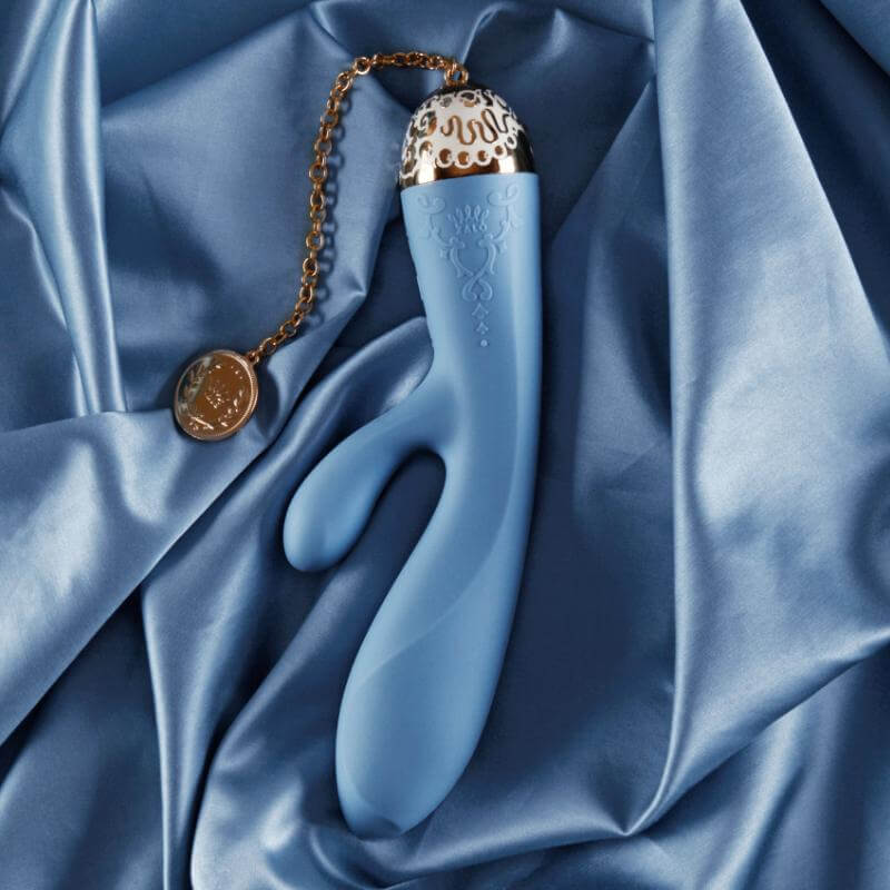 ZALO Rosalie Rabbit Vibrator in Royal Blue with dual motors on luxurious fabric background, part of the Versailles Series.