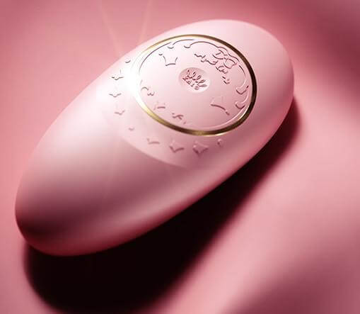 ZALO Jeanne Rouge Pink app-controlled rechargeable personal massager from the Versailles Series on a pink background.