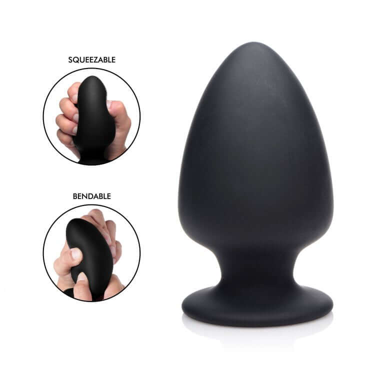 Squeeze It Silexpan large black anal plug, squeezable and bendable for comfortable insertion.