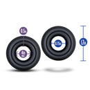 Two Blush Novelties Stay Hard Oversized Donut Rings in black elastomer with size measurements, 0.5in by 4in and 0.75in by 1.7in.