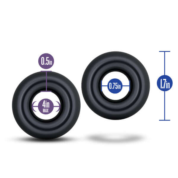 Two Blush Novelties Stay Hard Oversized Donut Rings in black elastomer with size measurements, 0.5in by 4in and 0.75in by 1.7in.