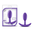 Vibrant Luxe Wearable Vibra Slim Plug Small in purple by Blush Novelties with easy retrieval base, in packaging and displayed outside.