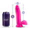 Au Naturel Bold Pleaser 7 inches Pink Dildo by Blush Novelties next to a can for size comparison.