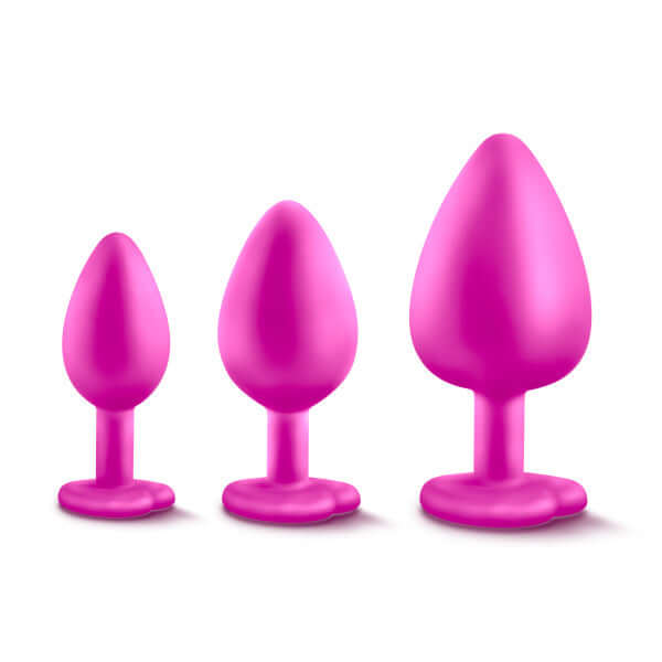 Luxe Bling Plugs Training Kit in pink, three different sizes - small, medium, large - white gems on base, ideal for safe anal play training.