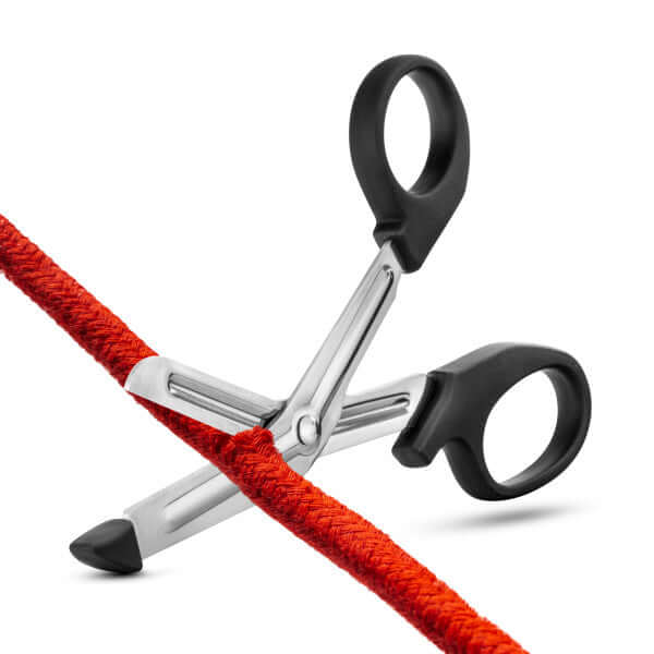 Temptasia Safety Scissors cutting red rope, black handles, Blush Novelties, stainless steel, angled handle, protected tips, 6.5 inch length.