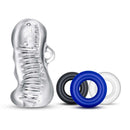 Quickie Kit Jerk Off Clear from Blush Novelties featuring a textured sleeve and colored rings for enhanced solo pleasure.