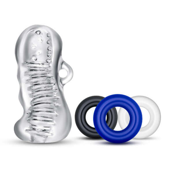 Quickie Kit Jerk Off Clear from Blush Novelties featuring a textured sleeve and colored rings for enhanced solo pleasure.