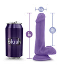 Purple 6-inch Au Naturel Bold Delight dildo from Blush Novelties with size comparison to a purple can for scale.