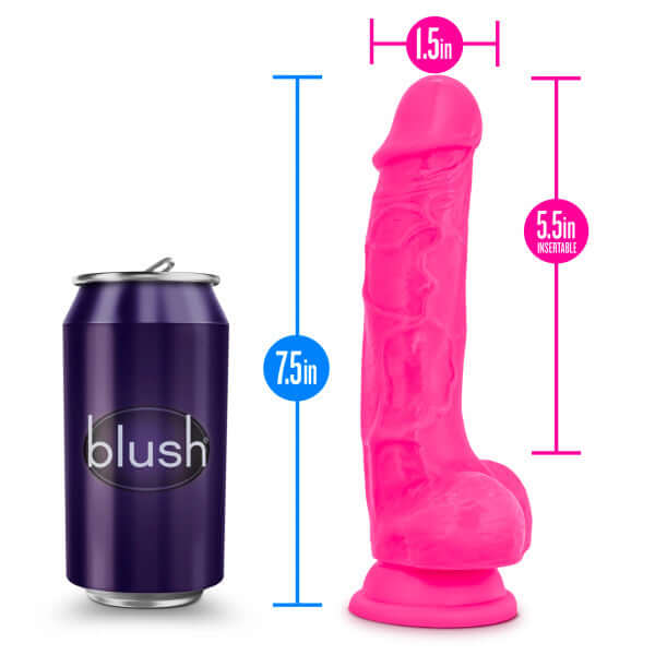 Neon pink 7.5 inch silicone dual density dildo with balls and suction cup base, shown next to a can for size comparison.