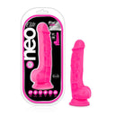 Neo Elite 7.5 inches Silicone Dual Density Cock with Balls Neon Pink in packaging and standing upright, featuring realistic details and suction cup base.