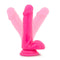 Neon pink 6-inch silicone dual density cock with balls by Neo Elite featuring a realistic design and suction cup base.