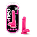 Neo Elite 6 inches Neon Pink Silicone Dual Density Cock with Balls by Blush Novelties in packaging and standing upright.