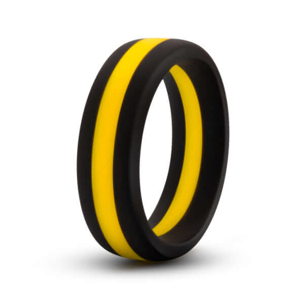 Performance Silicone Go Pro Cock Ring in Black and Gold by Blush Novelties - Comfortable and stretchy silicone design for a secure fit.