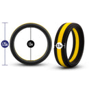 Performance Silicone Go Pro Cock Ring Black, Gold, Black, dimensions shown: 1.75 inches outer diameter, 1.5 inches inner diameter, 0.5 inch width.