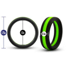 Performance Silicone Go Pro Cock Ring in Black and Green with dimensions: 1.75-inch outer diameter, 1.5-inch inner diameter, 0.5-inch width.