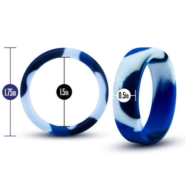 Blue camouflage silicone cock ring with dimensions of 1.75-inch outer diameter, 1.5-inch inner diameter, and 0.5-inch width.